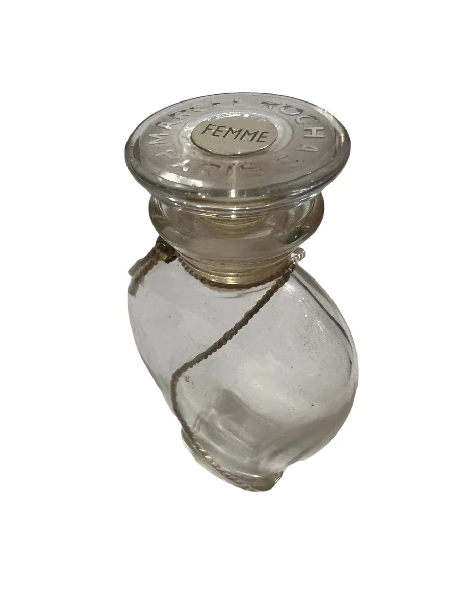 antique perfume bottle with round lid and engraving