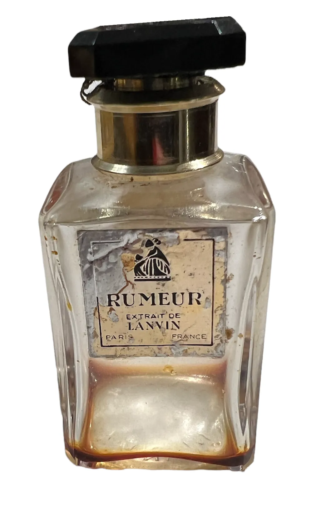 antique Lanvin perfume bottle with faded labels