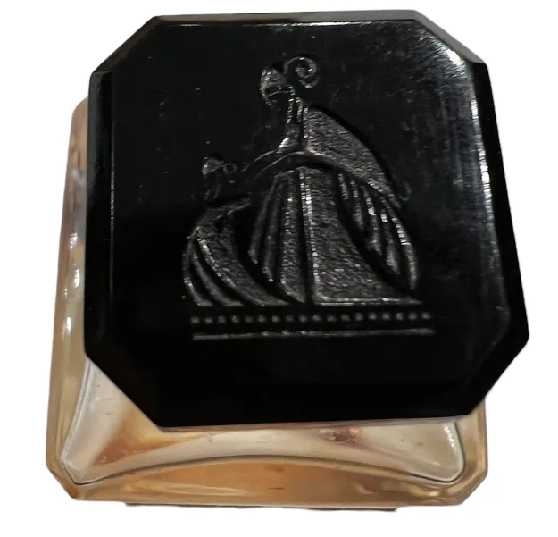 flacon de parfum ancien avec couvercle noir en relief
