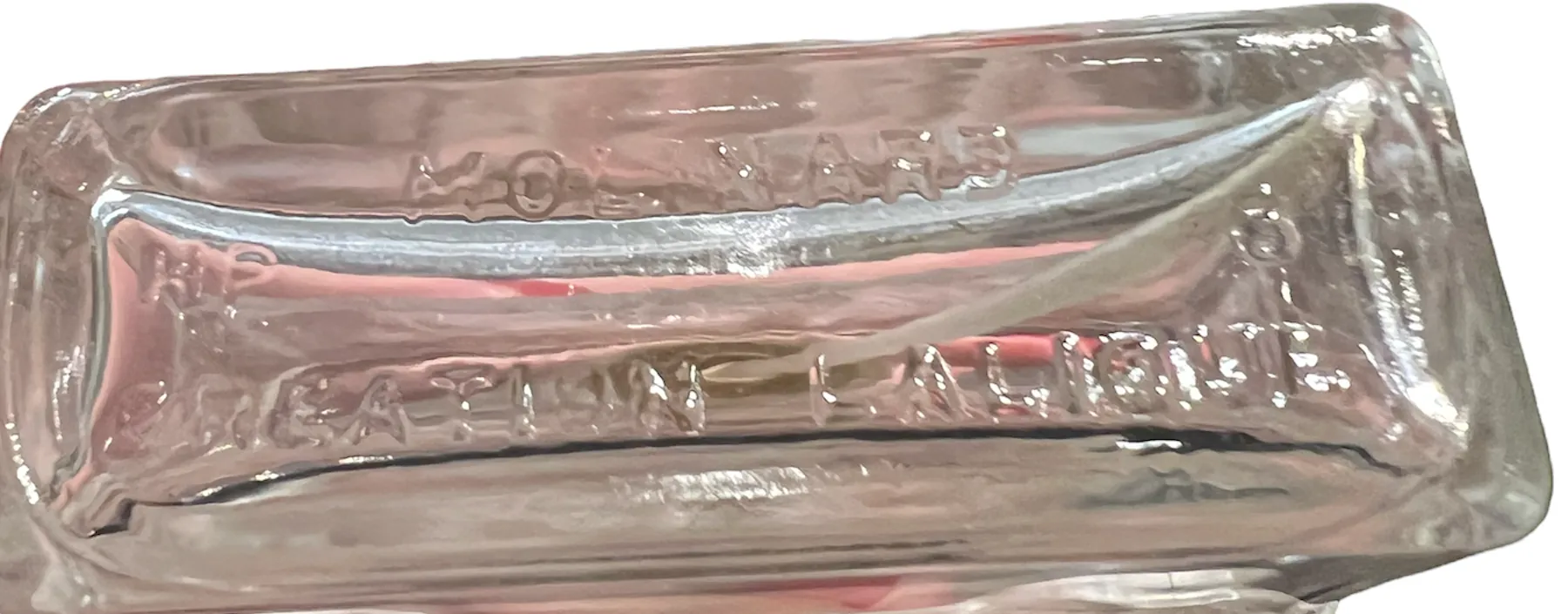 Antike Parfümflasche mit gravierten Details oben