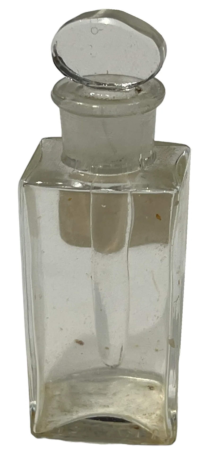 Flacon de parfum ancien en verre, forme rectangulaire, bouchon rond.