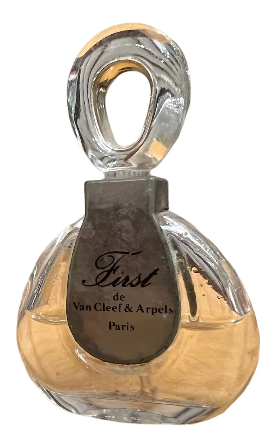 flacon de parfum ancien de Van Cleef & Arpels avec design élégant
