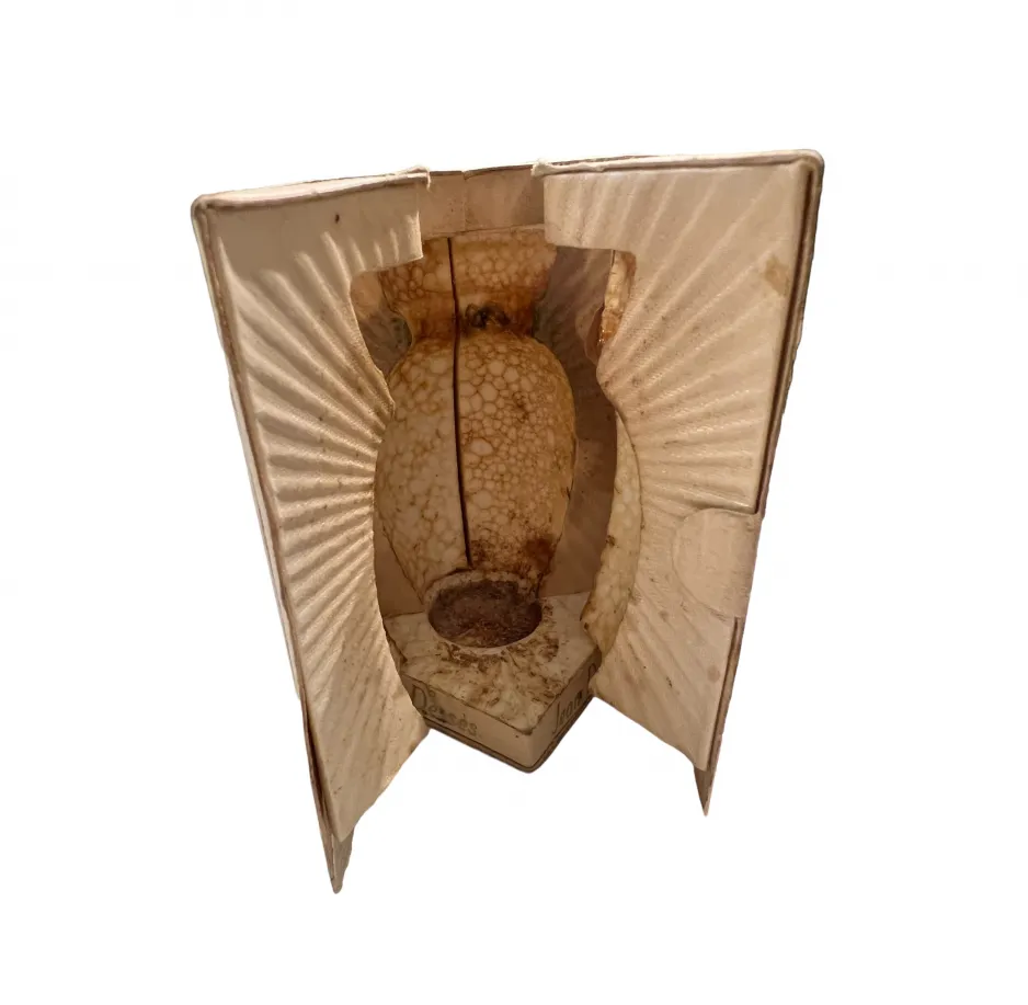 antique perfume bottle with unique design in box