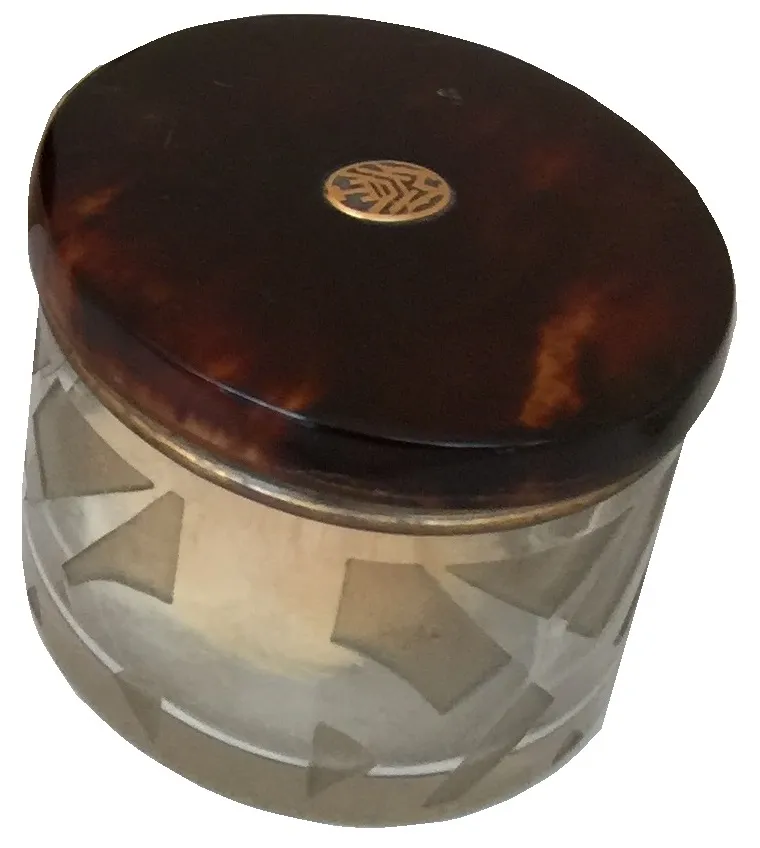 frasco antigo de perfume com tampa de madeira decorativa, com gravações geométricas