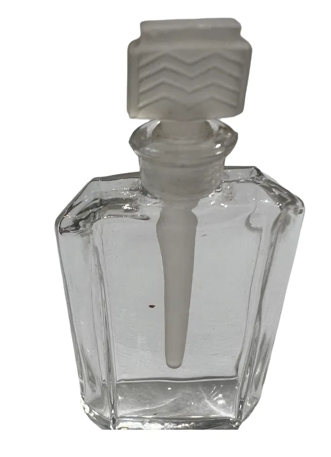 frasco de perfume antiguo de vidrio con aplicador blanco