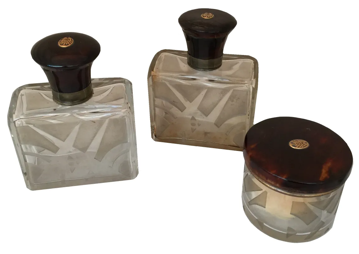 flacone di profumo antico in vetro con coperchio decorativo