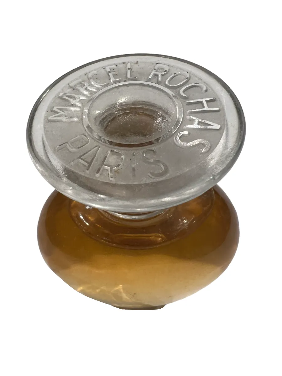 Frasco de perfume antiguo con tapa de cristal, marca Marcel Rochas, Paris. Estilo clásico.