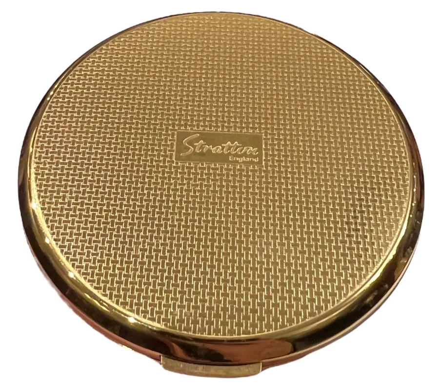 compatto dorato antico con texture elegante