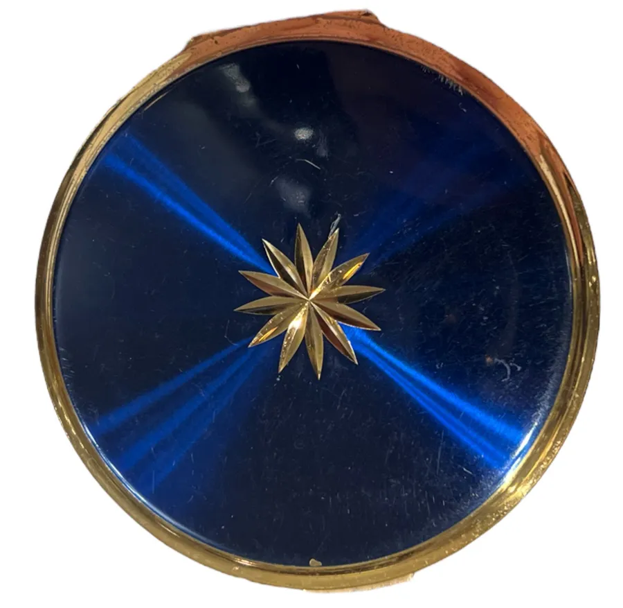polvera antica rotonda blu con stella dorata