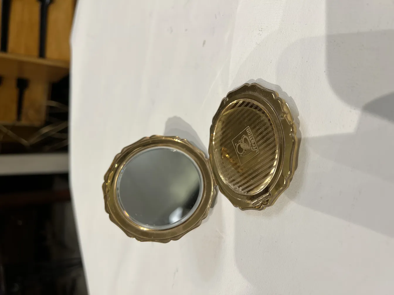 antique compact with mirror, gold decorations, vintage style