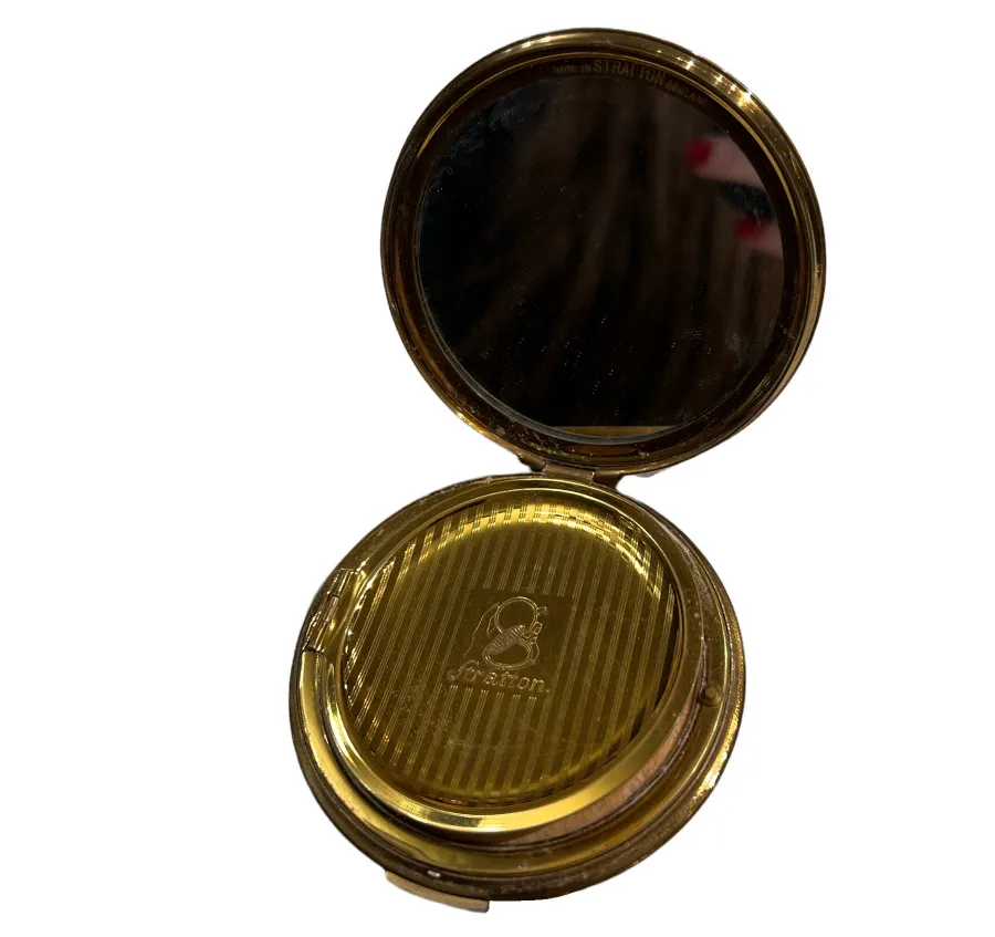 antique gold compact with mirror and elegant details