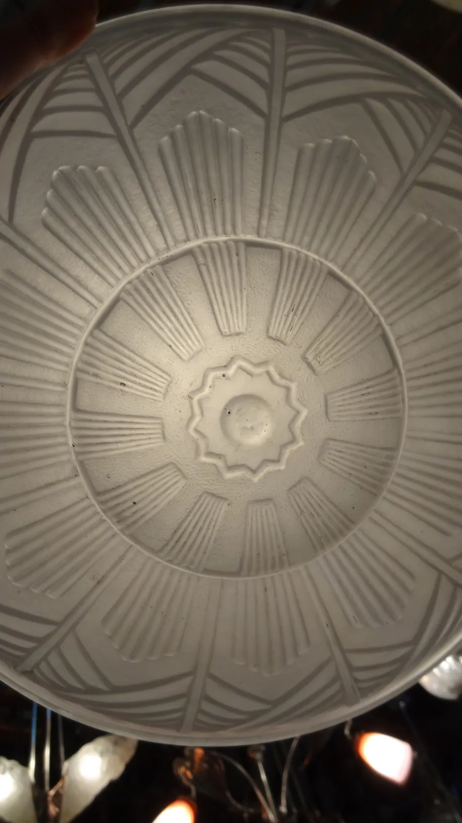 antique ceiling light with decorative design