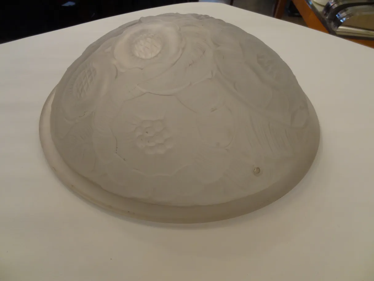 antique ceiling light with a decorated surface, floral style