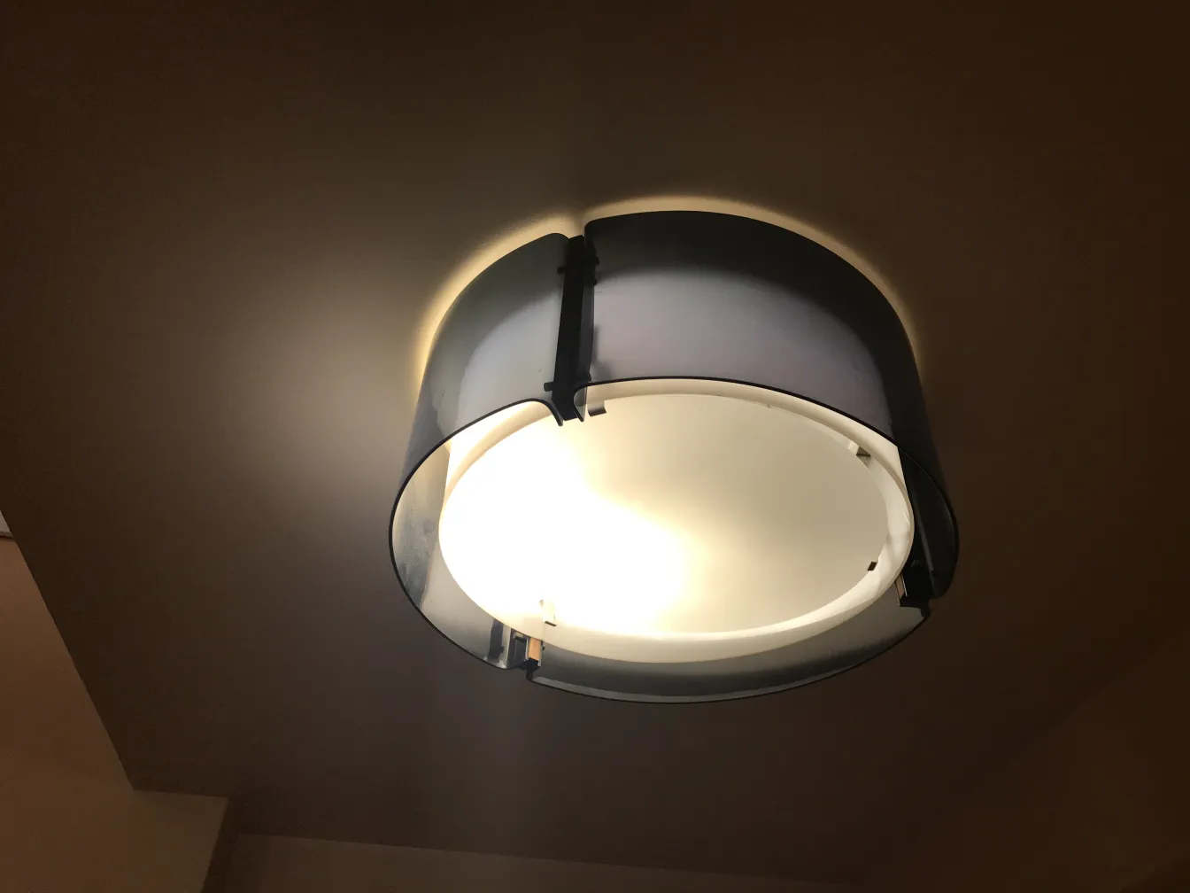 antique ceiling light illuminating the room