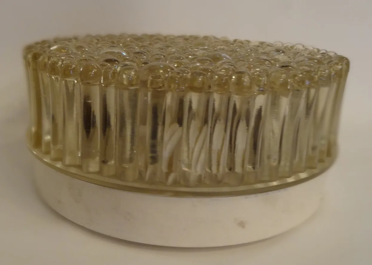 Antique ceiling light with circular design and bubbles, perfect for illumination