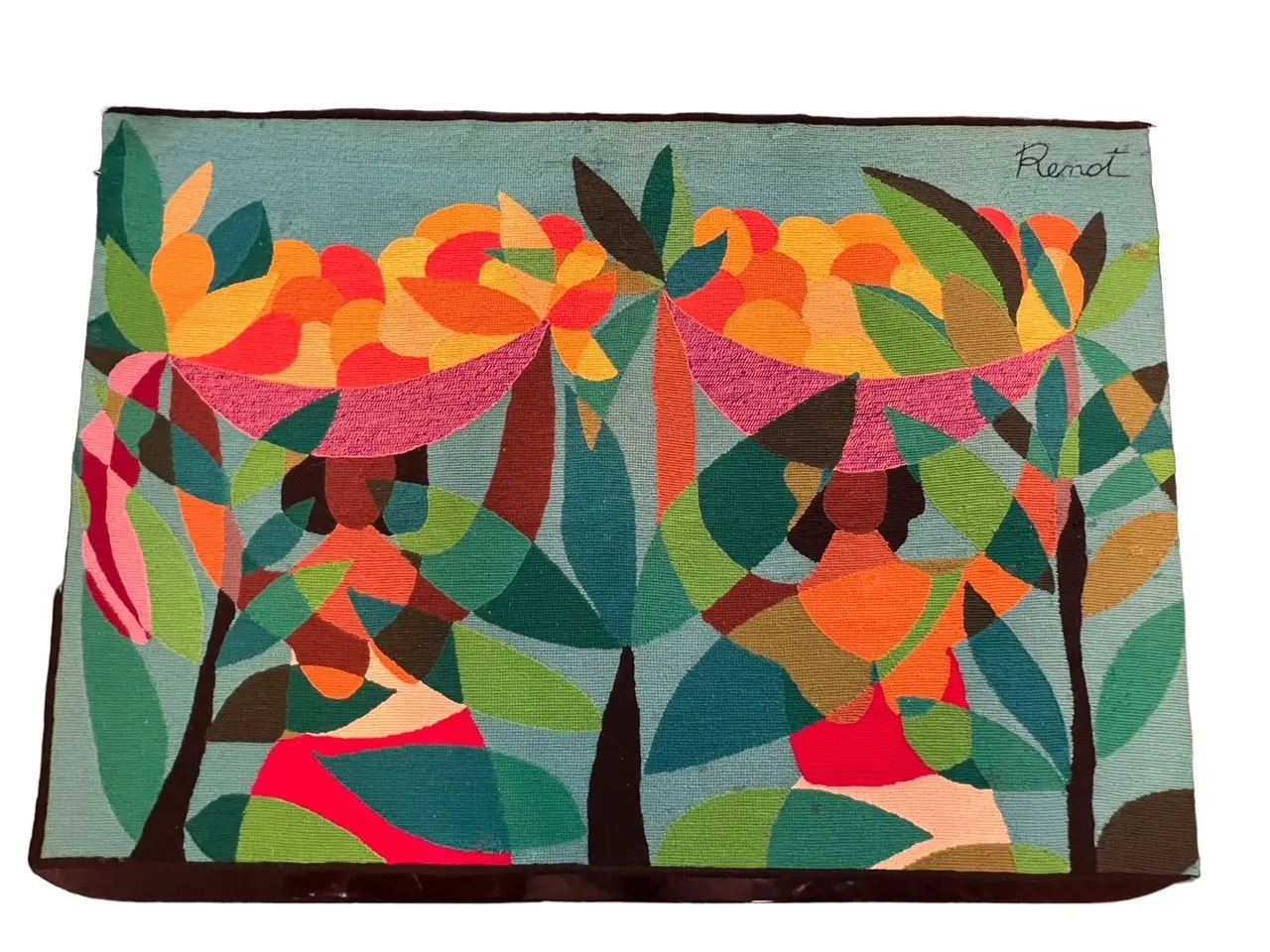 antique tapestry featuring vibrant colors and abstract shapes