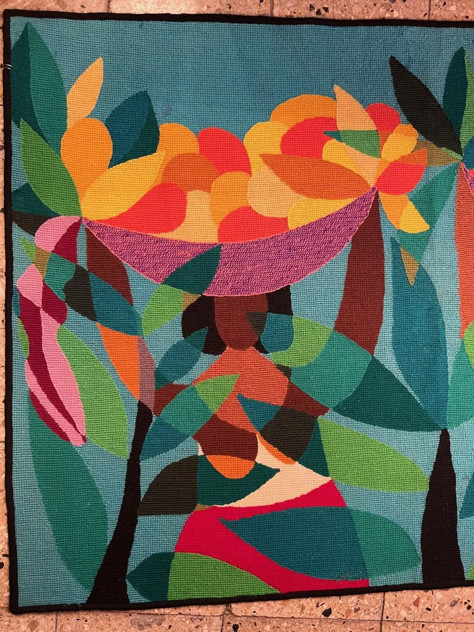 antique colorful tapestry with abstract shapes and greens