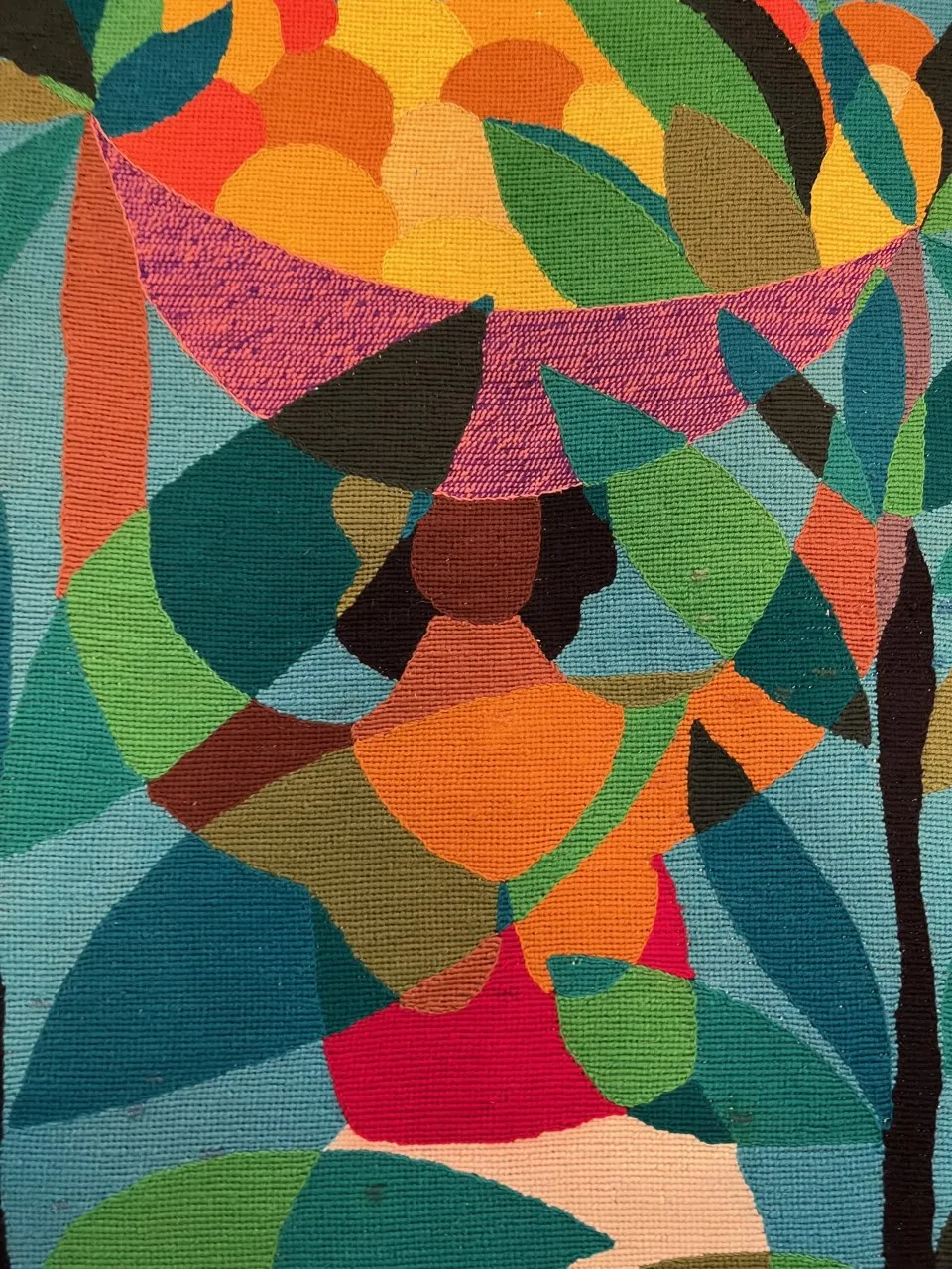 antique tapestry featuring vibrant abstract shapes