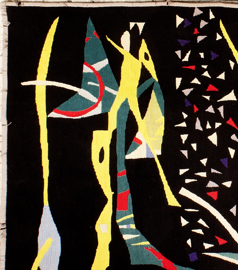 antique tapestry featuring abstract vibrant shapes