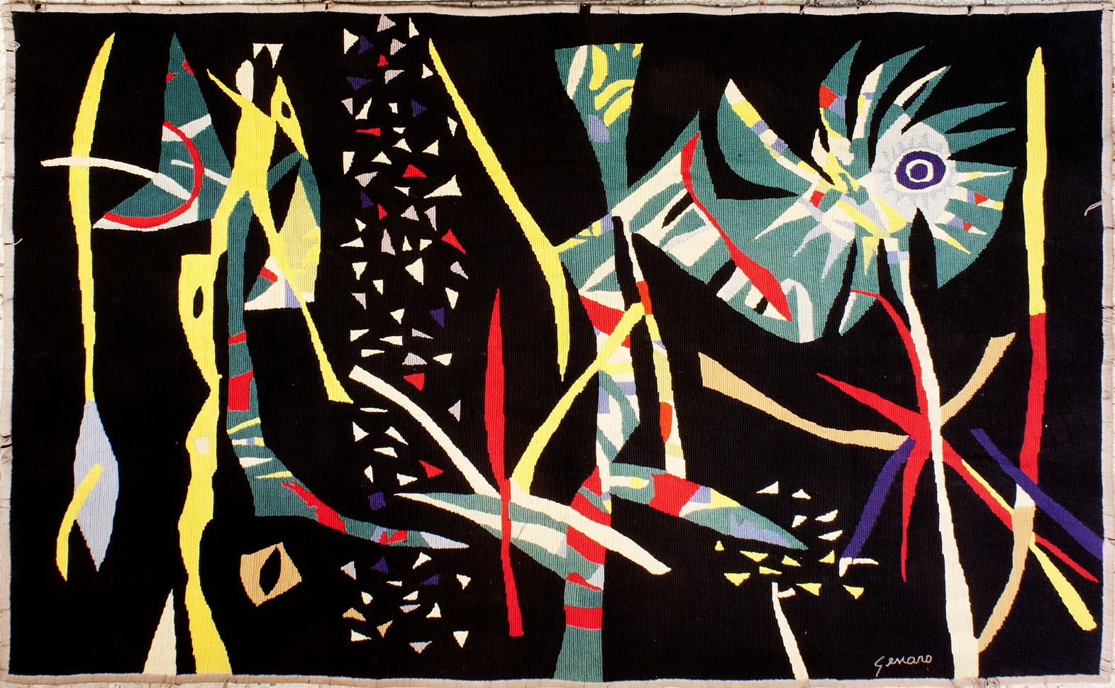 antique tapestry with vibrant colors and geometric shapes