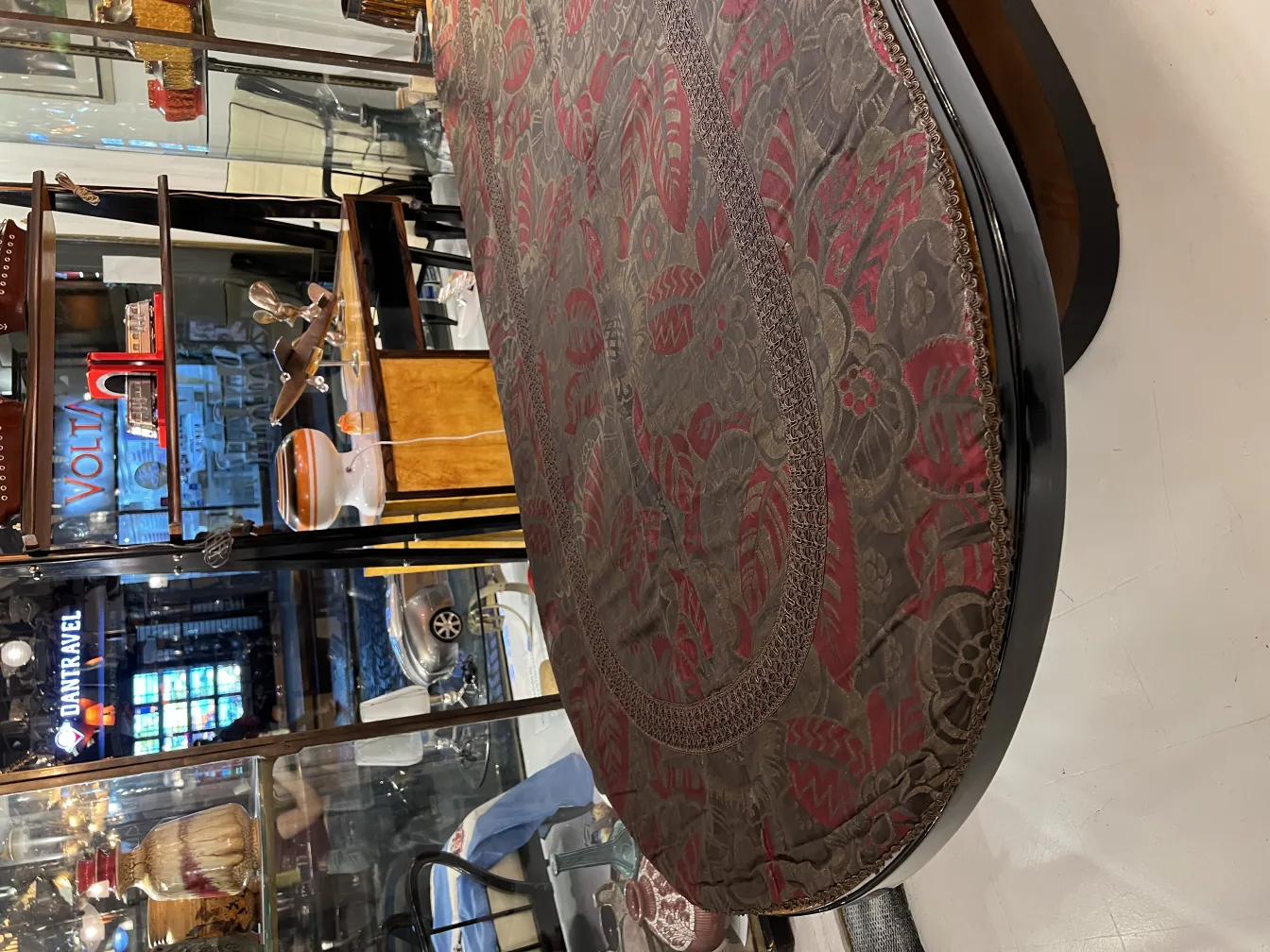 antique tablecloth featuring dark decorative patterns