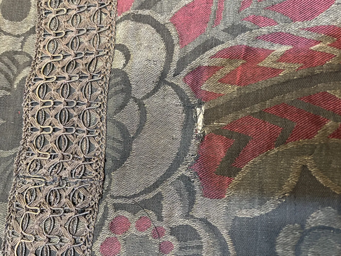 antique tablecloth with multicolored floral pattern