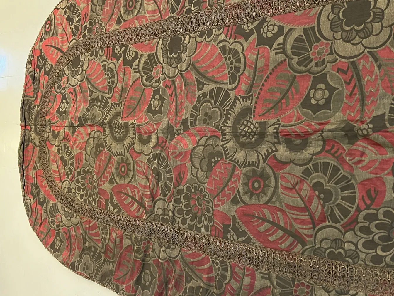 antique tablecloth featuring colorful floral and leaf patterns