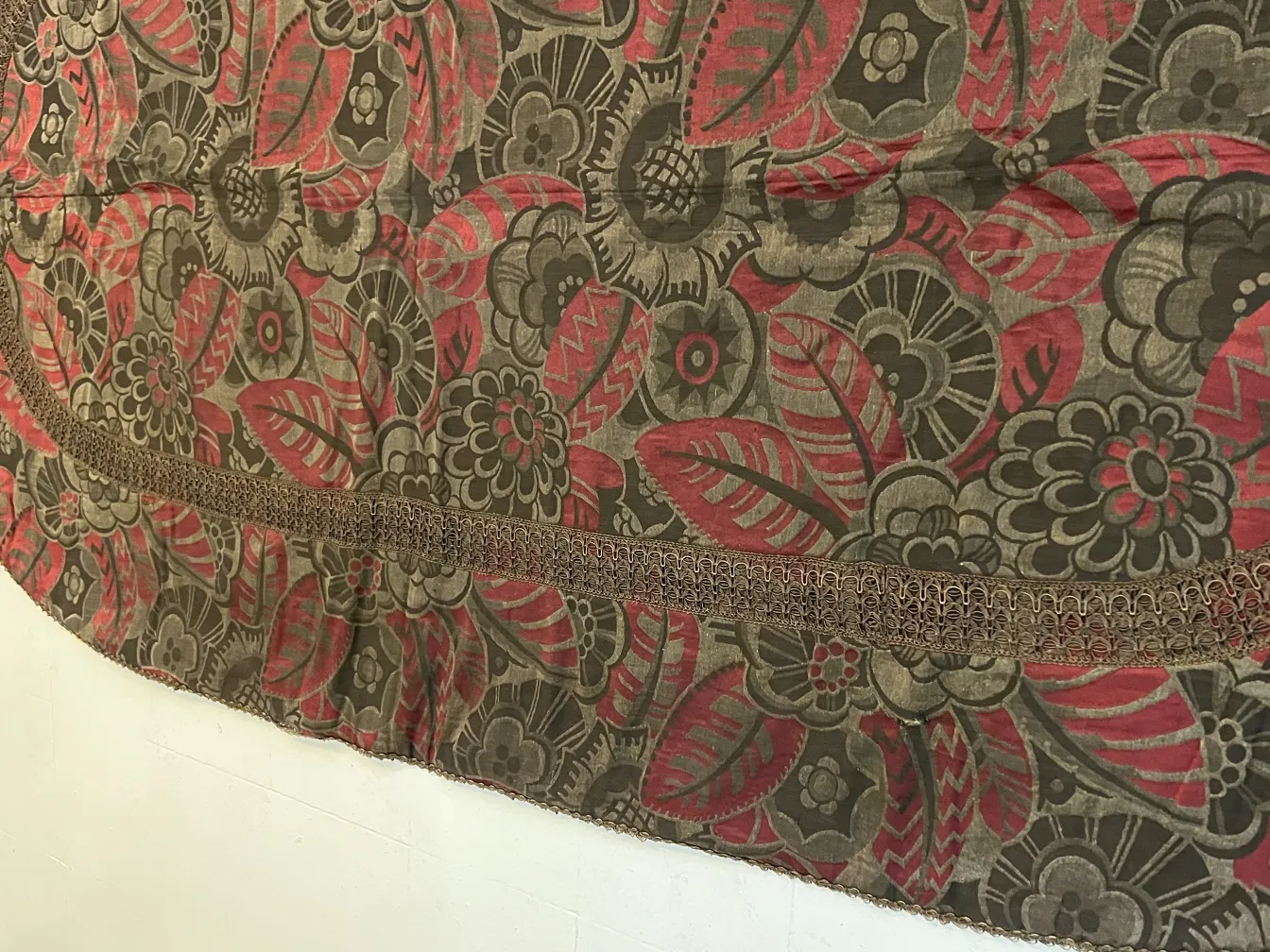 antique tablecloth with red and green floral pattern