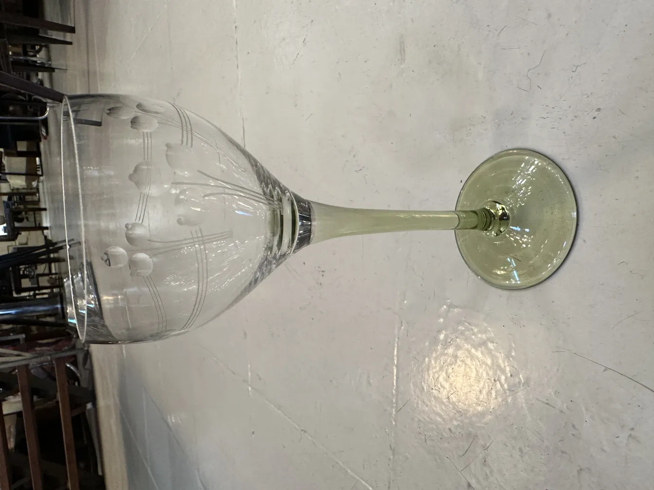 6 antique decorated glasses with an elegant design on a light background