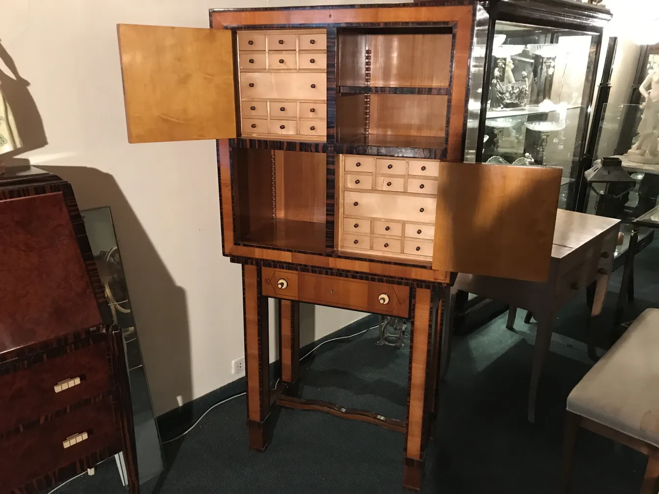 antique cigar humidor with small compartments