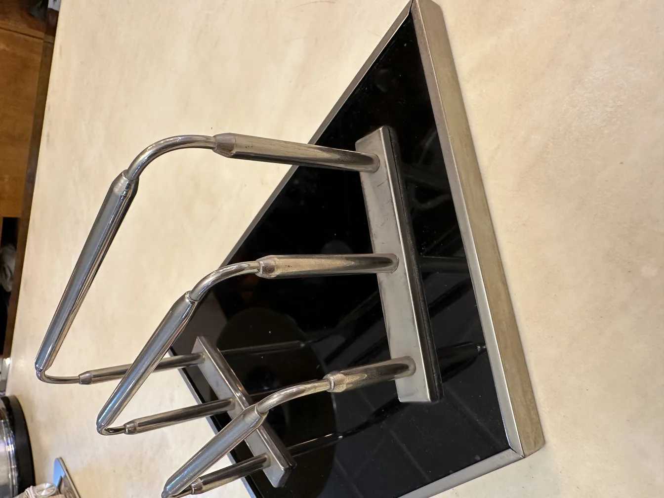 antique WMF card tray with decorative arms in an elegant setting