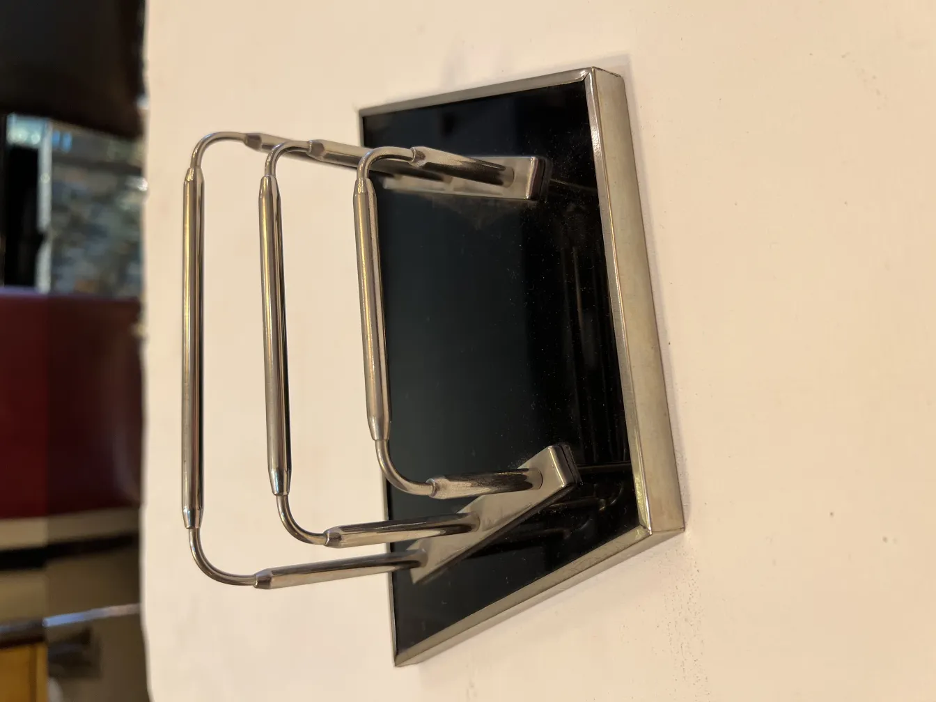 Antique card tray WMF displayed in a minimalist setting.