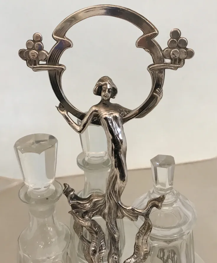 Conjunto antiguo de salero y pimentero con aceite y vinagre WMF. Detalles en la parte superior.