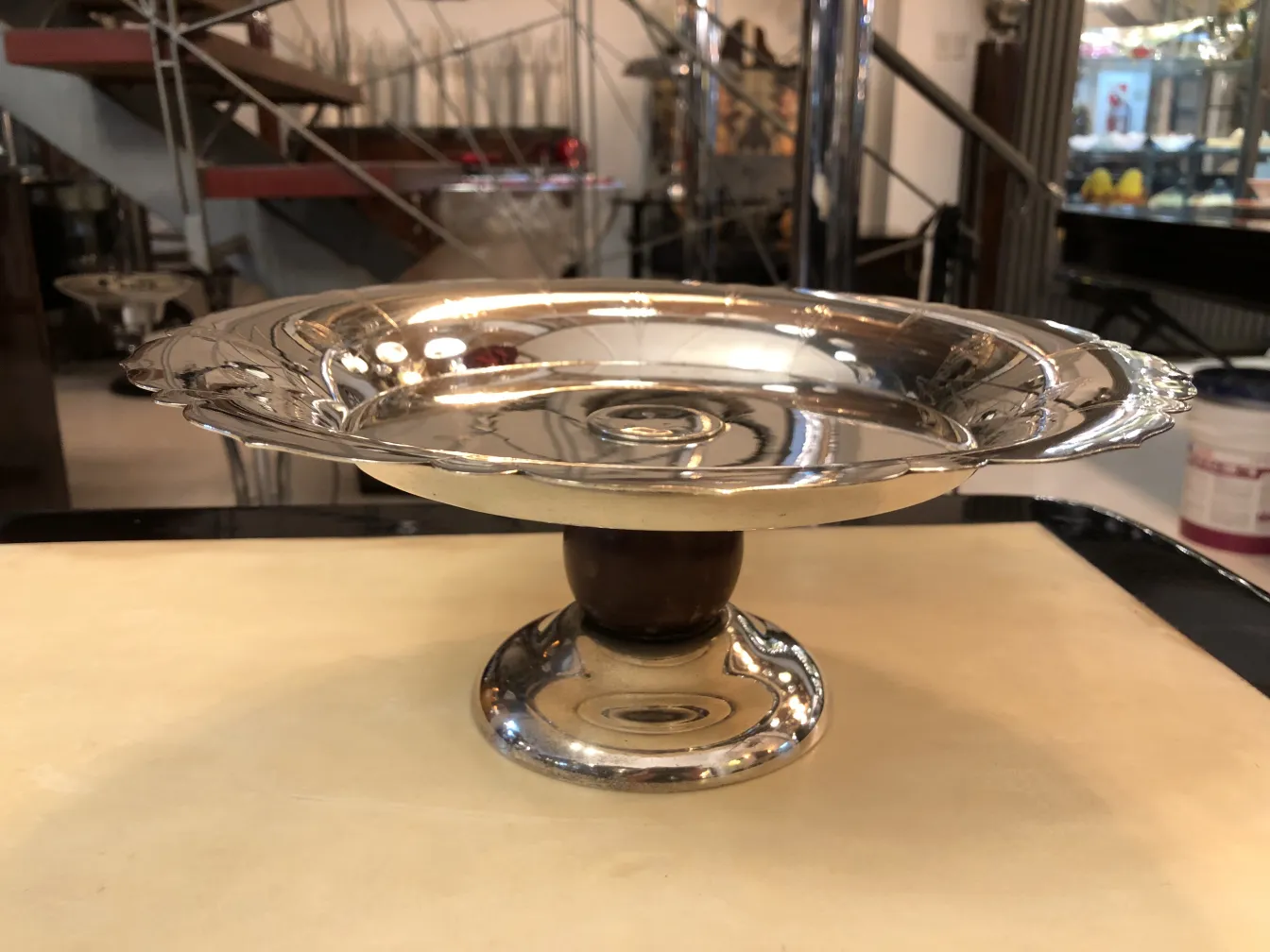 Antique pastry plate with a stylish base and decorative edges