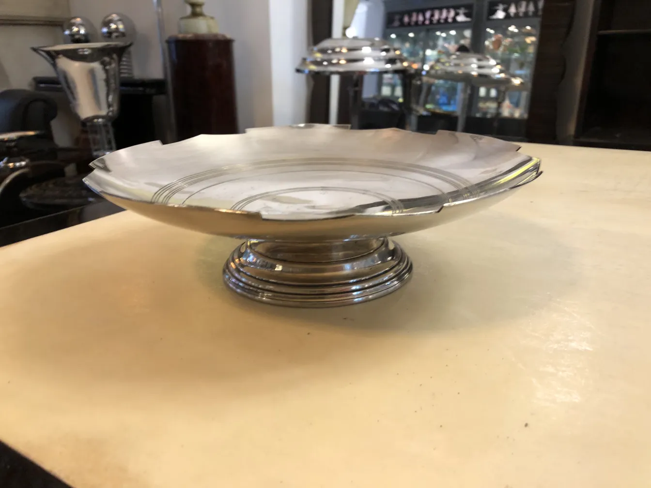 pastry plate with classic design and distinctive pedestal in rustic environment