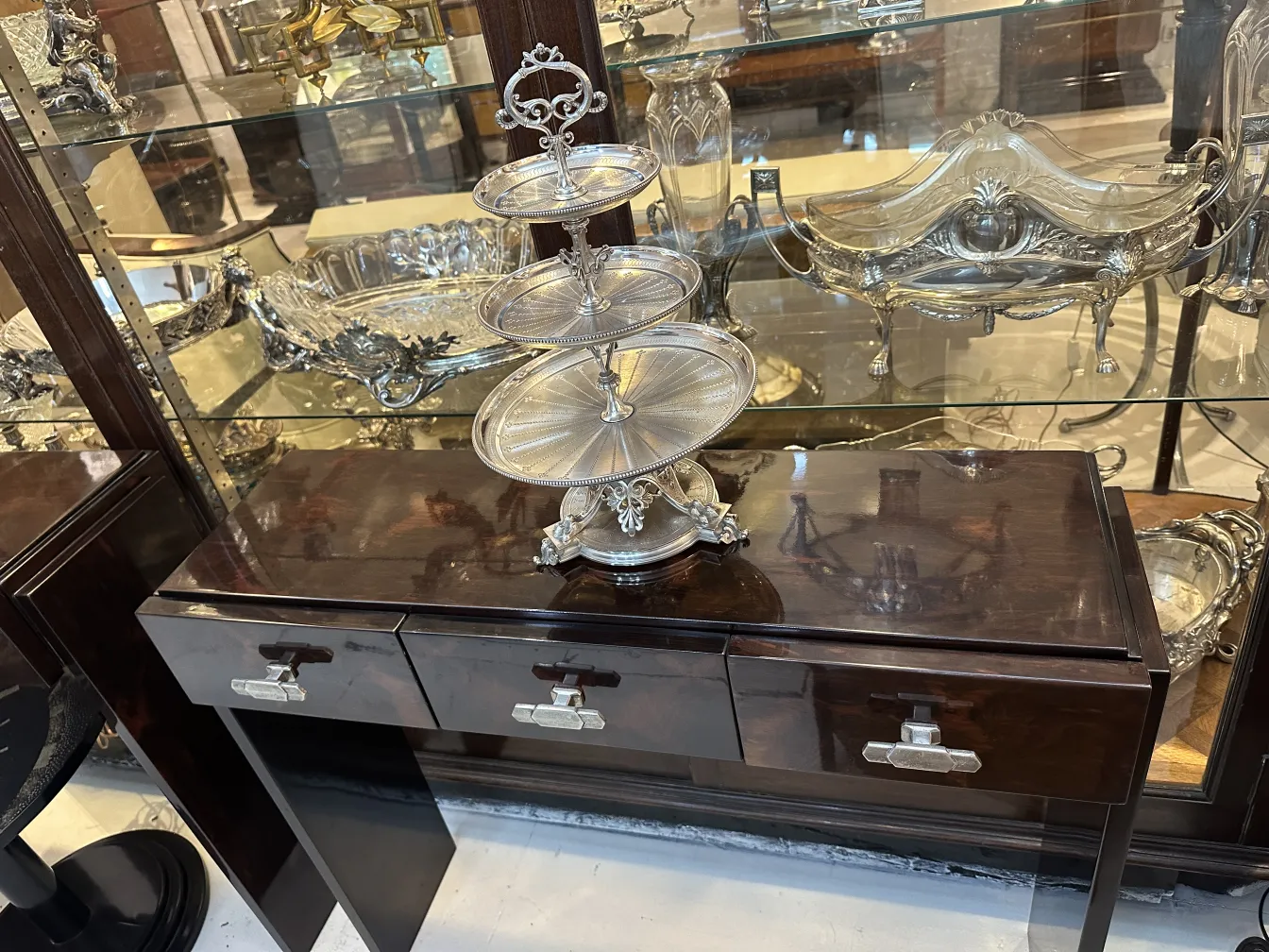 Antique pastry plate on decorative base, three tiers