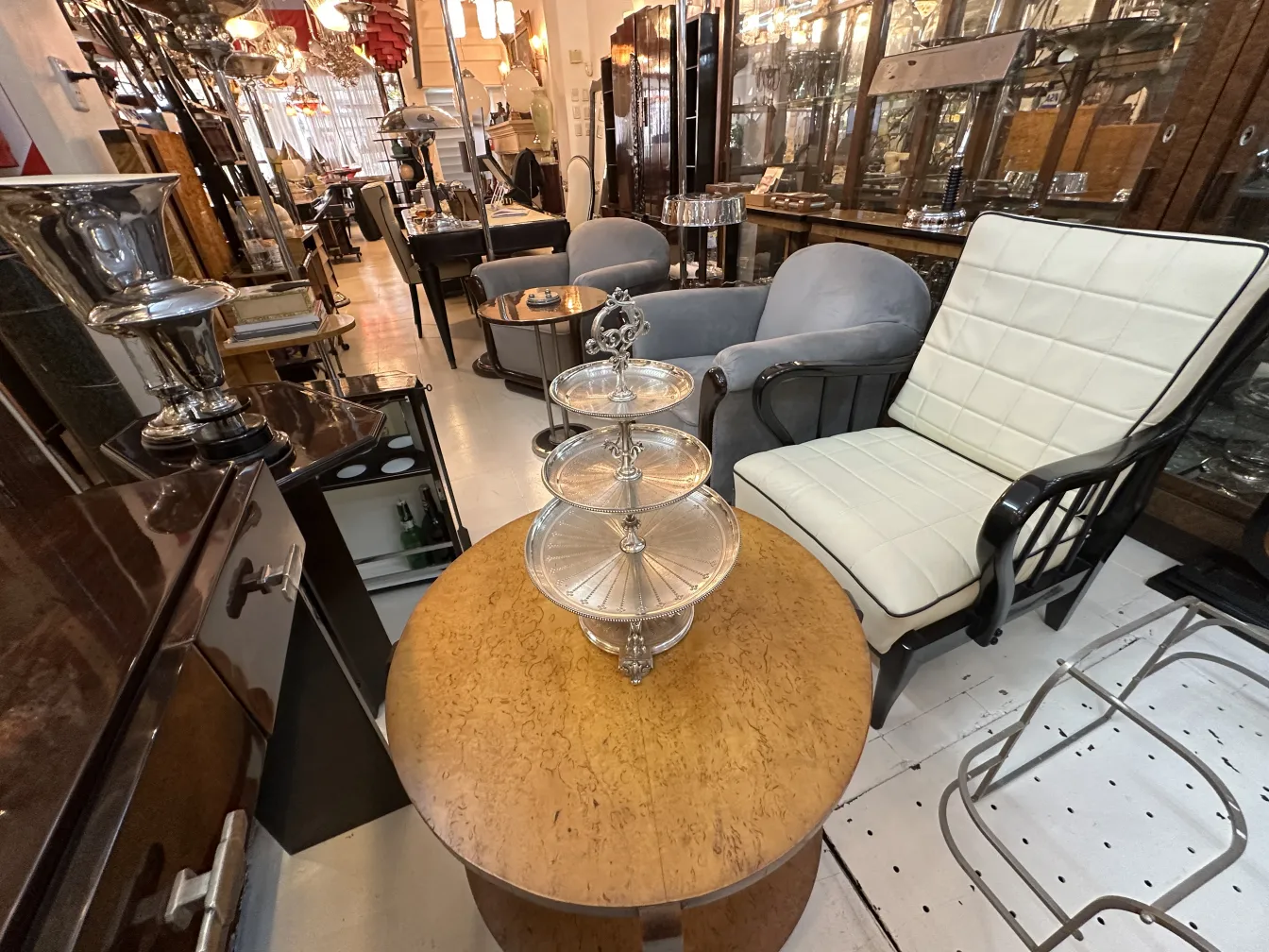 View of an antique pastry plate in an antique setting, surrounded by classic decor.