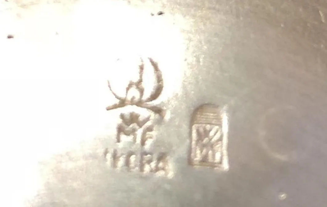 Antique pastry plate with decorative details.