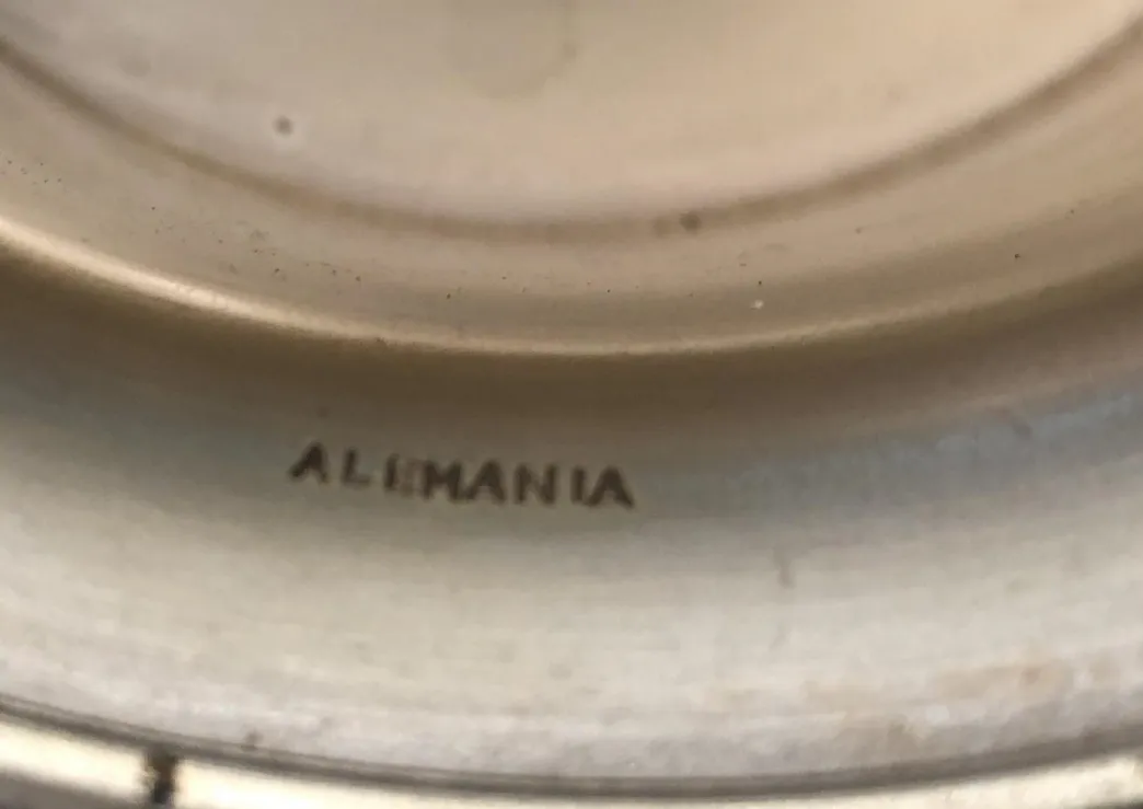 Antique pastry plate with classic design.