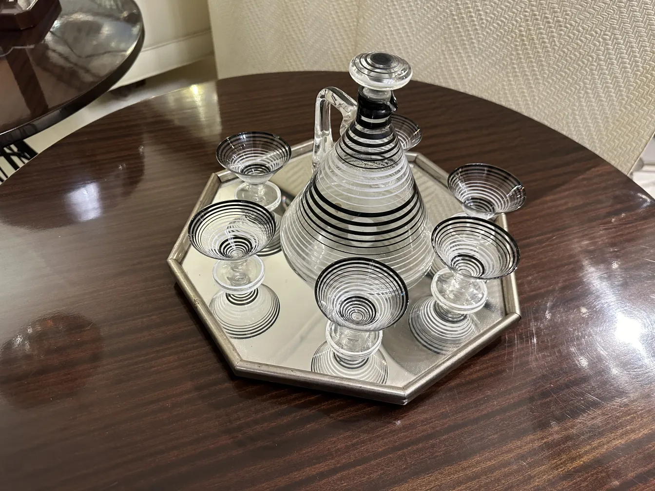 Antique liqueur set with 6 glasses in an elegant setting