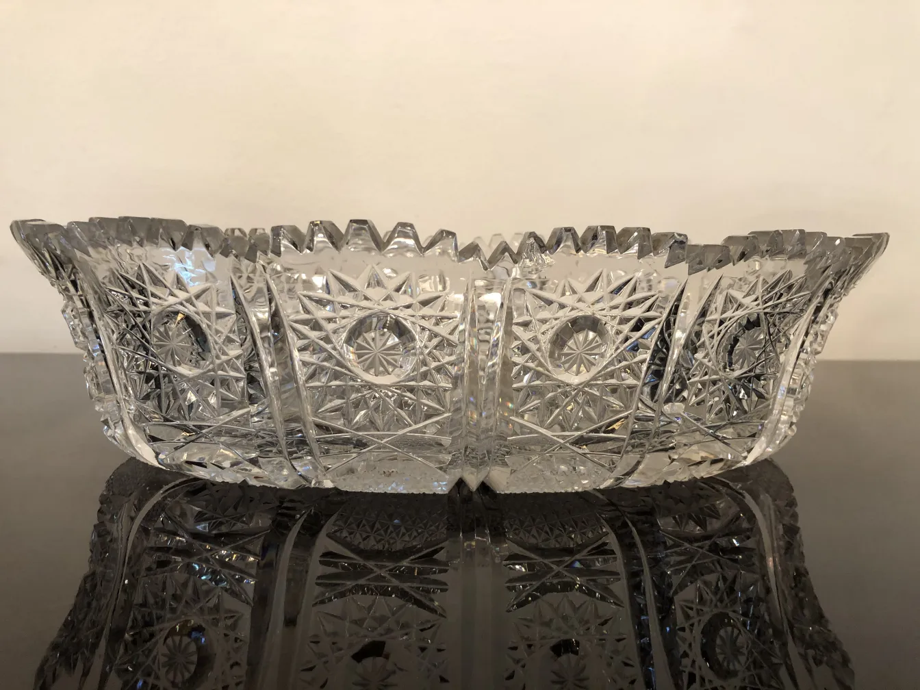 antique decorative centerpiece with carved design on table