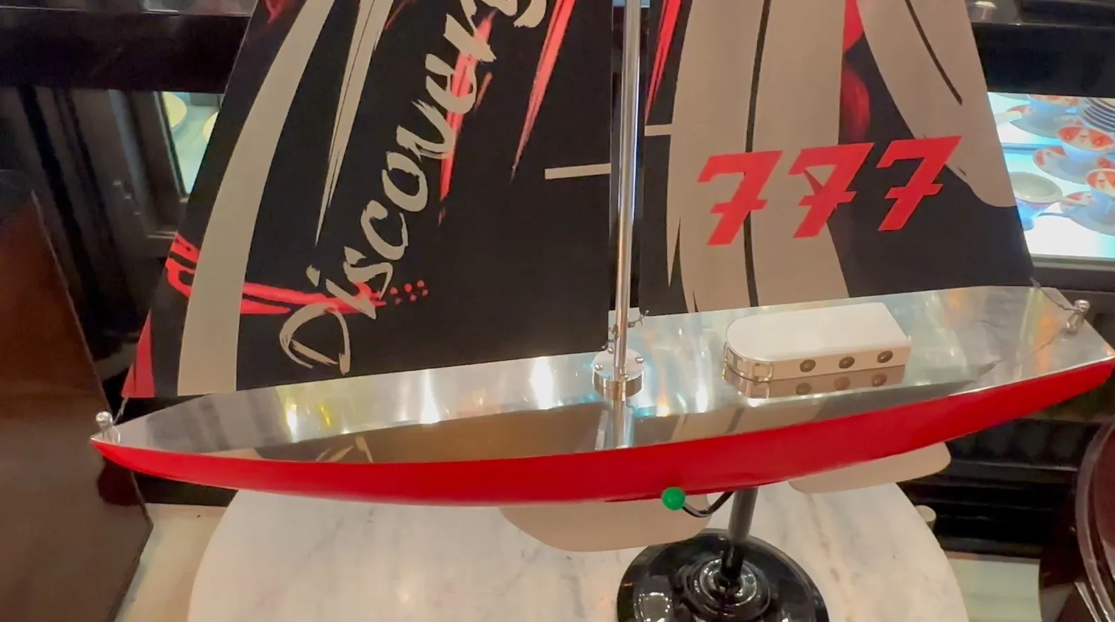 Antique designer's ship with red and black details.