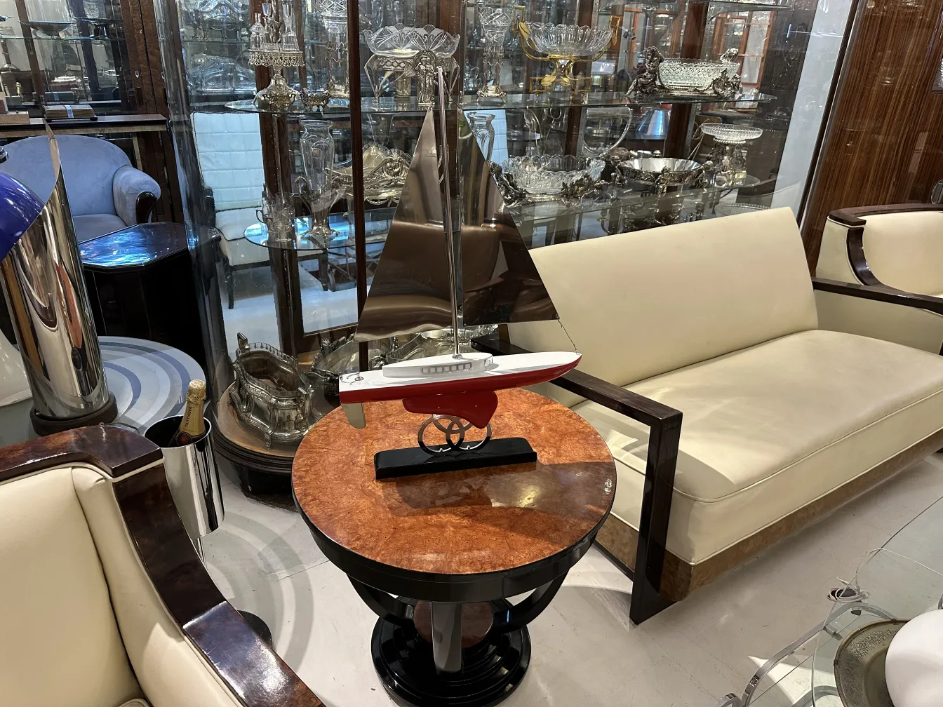 designer's ship in an elegant setting with antiques