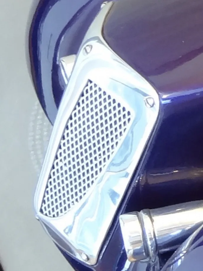 Close-up of the front of the antique designer's car with grill