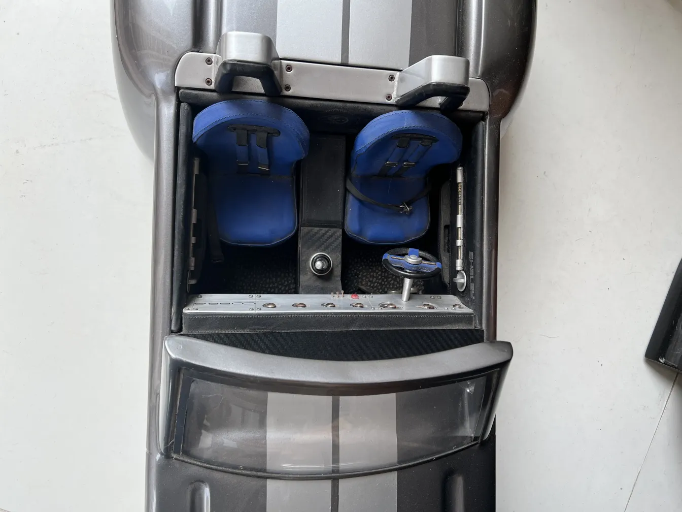 top view of the designer's antique car with blue seats