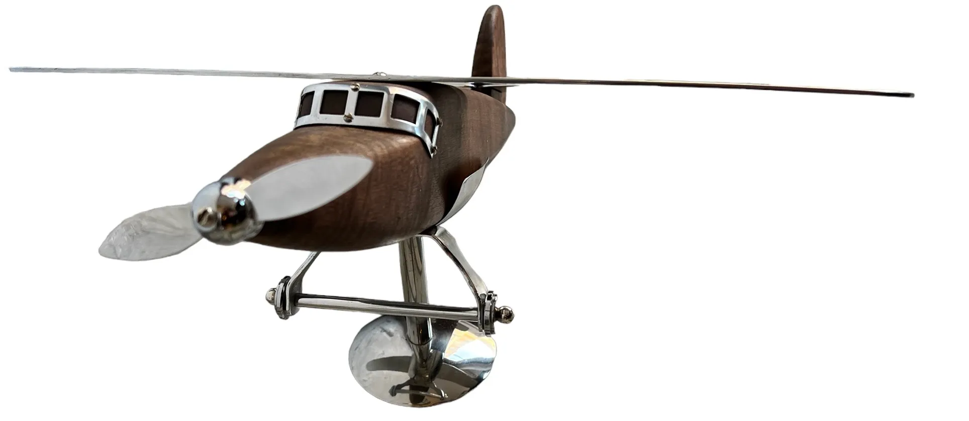 antique aircraft model with shiny metal propeller