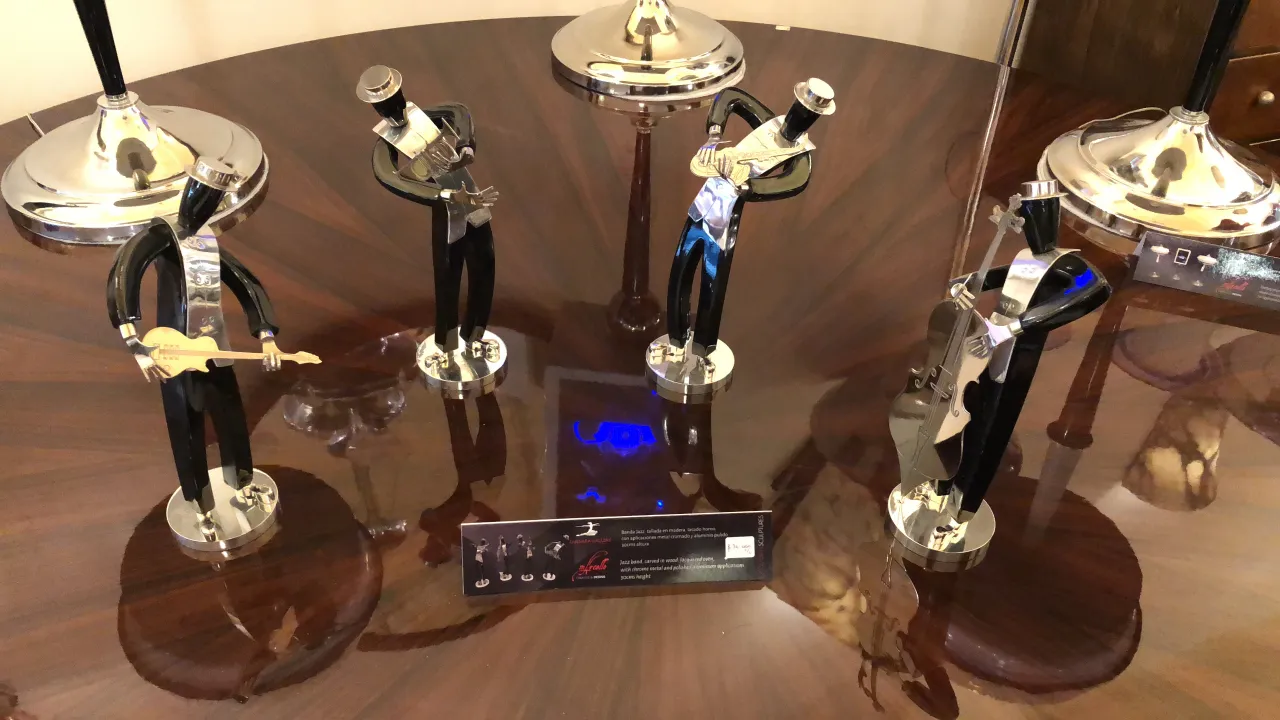 metal musicians in dynamic poses on a table