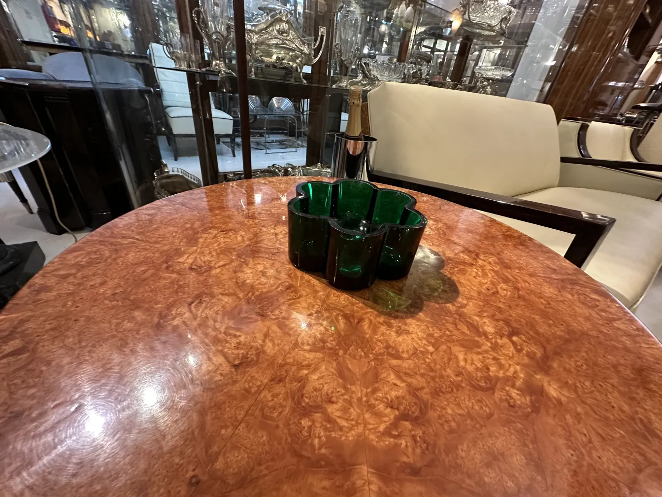 antique centerpiece on polished wooden table with decor