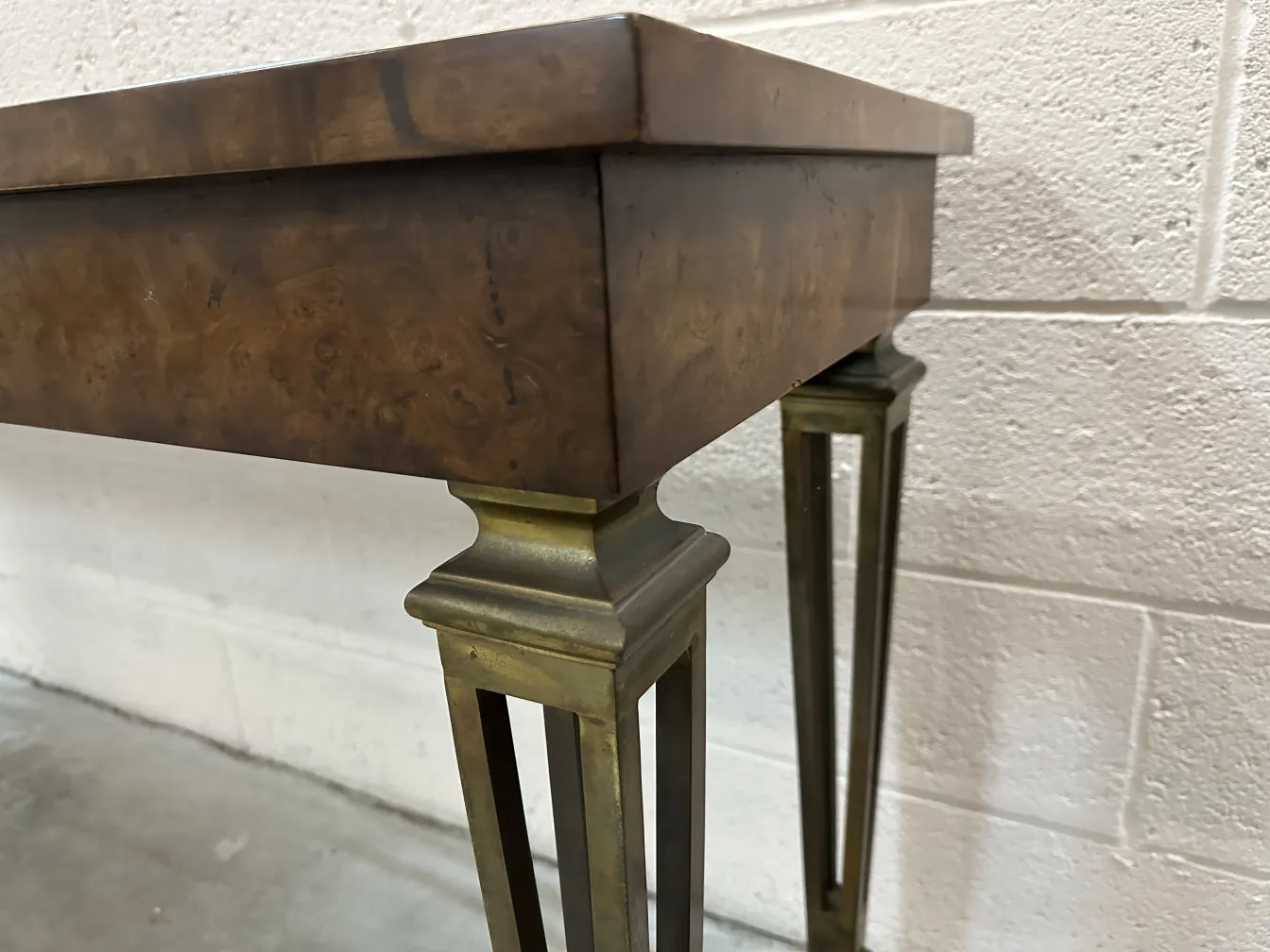 antique console featuring decorative details and legs