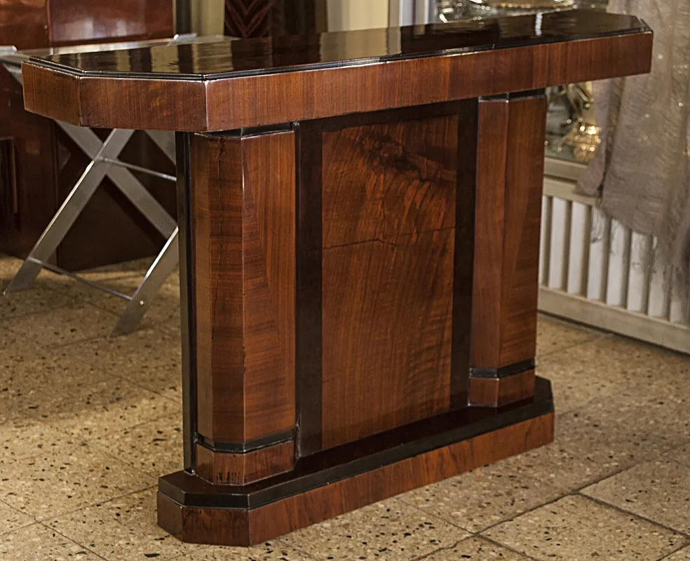 two antique consoles with elegant design in setting